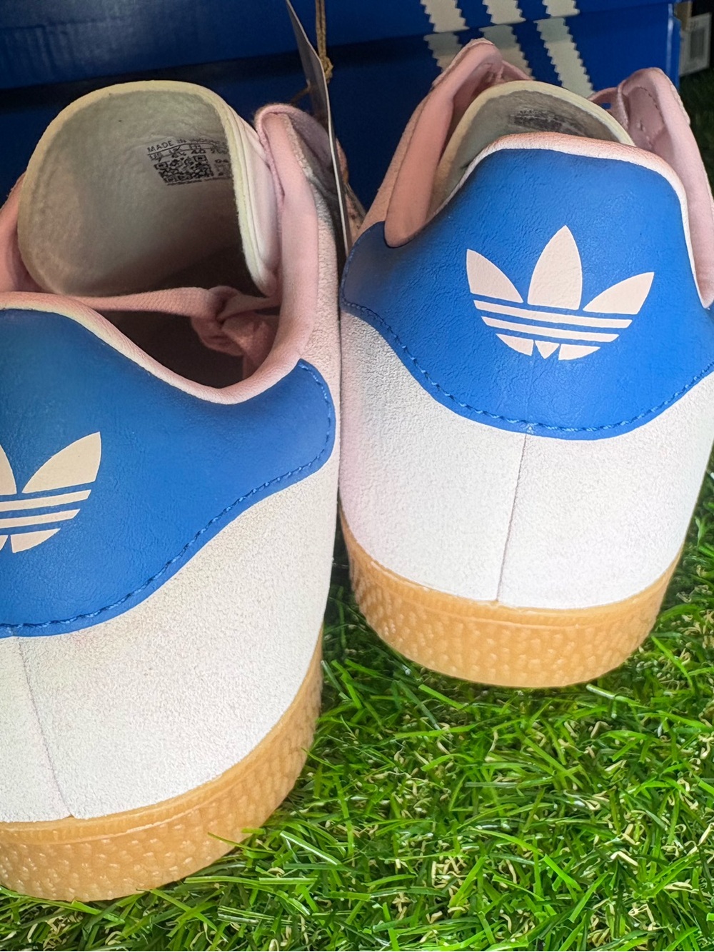 Adidas Gazelle Suede Sneakers in Light Pink with white Stripes and a blue heel. - Picture 6 of 8